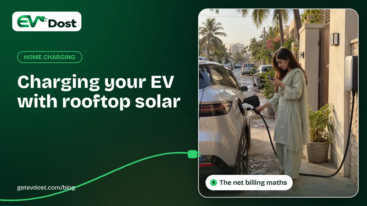 A woman in a pale green shalwar kameez plugs in a white electric car at golden hour outside her home